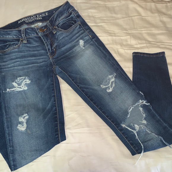 Medium wash ripped “super stretch” skinny jeans - Picture 2 of 2